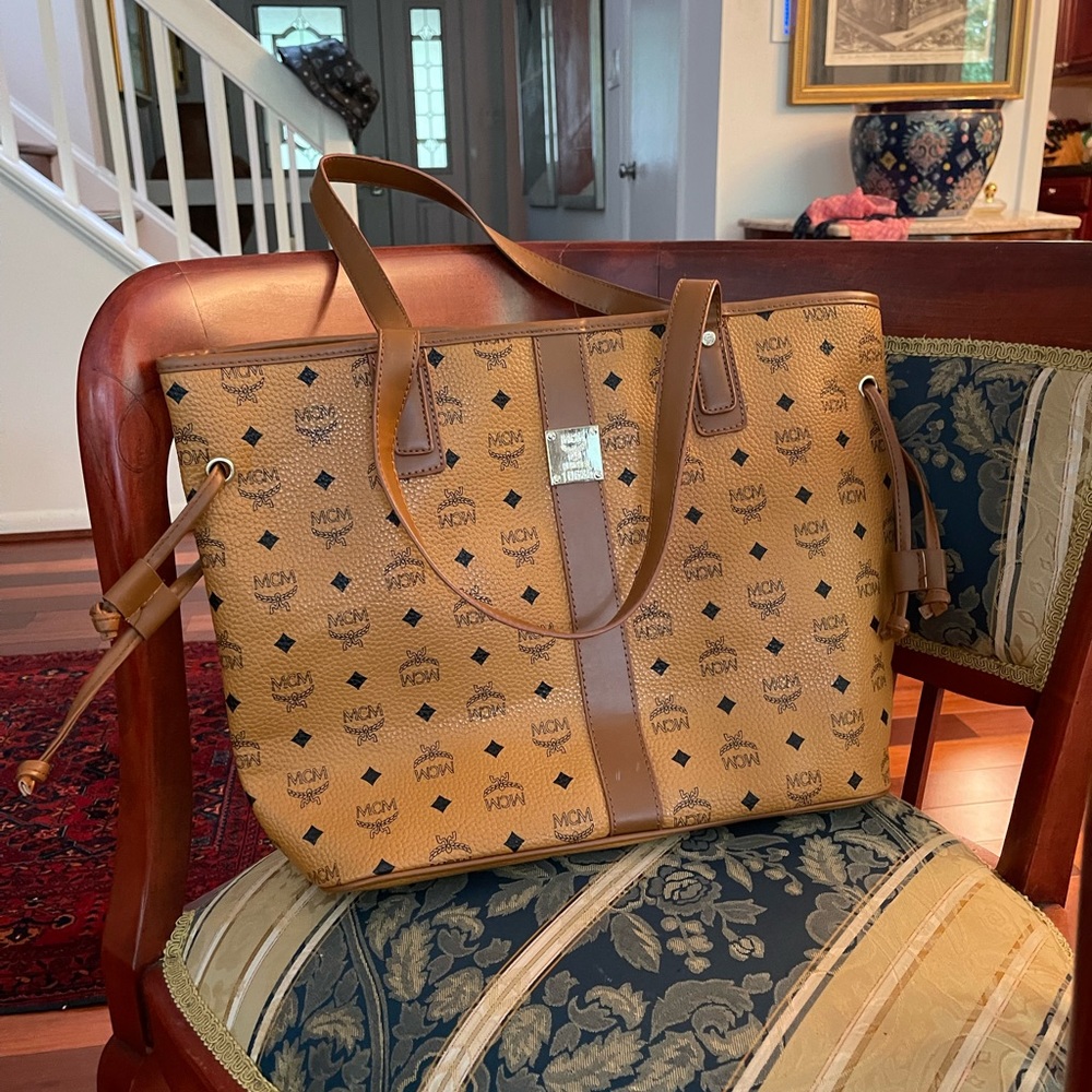 MCM tote with matching zipppered makeup bag.